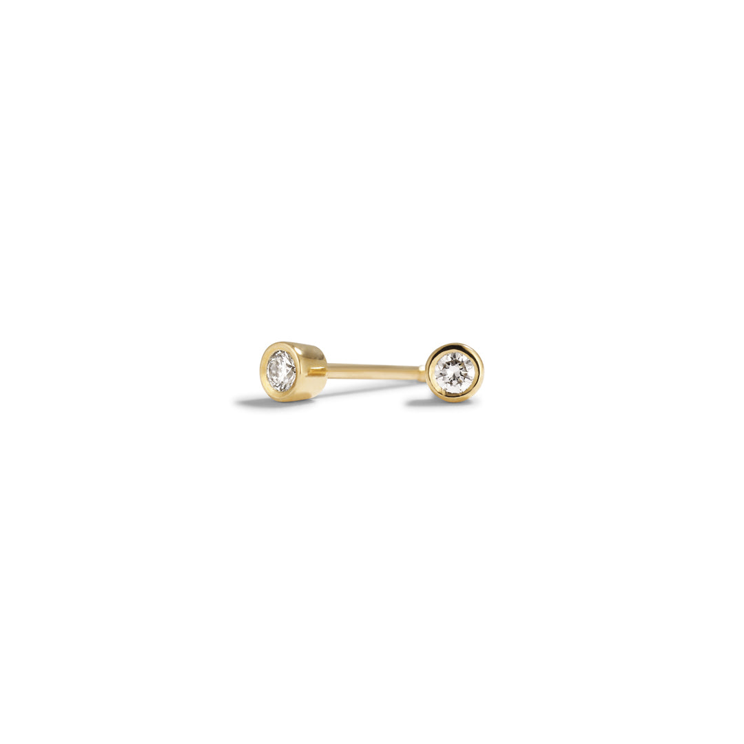 Bezel solitaire ørestikker med 2x 0,05 ct.