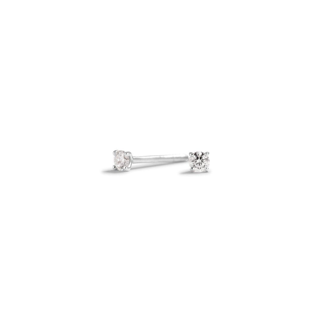 Solitaire ørestikker i hvidguld med 2x 0,05 ct.