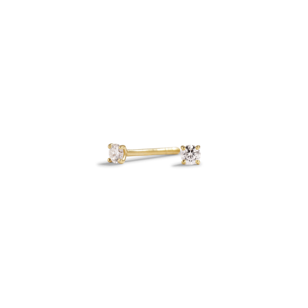 Solitaire ørestikker med 2x 0,05 ct.