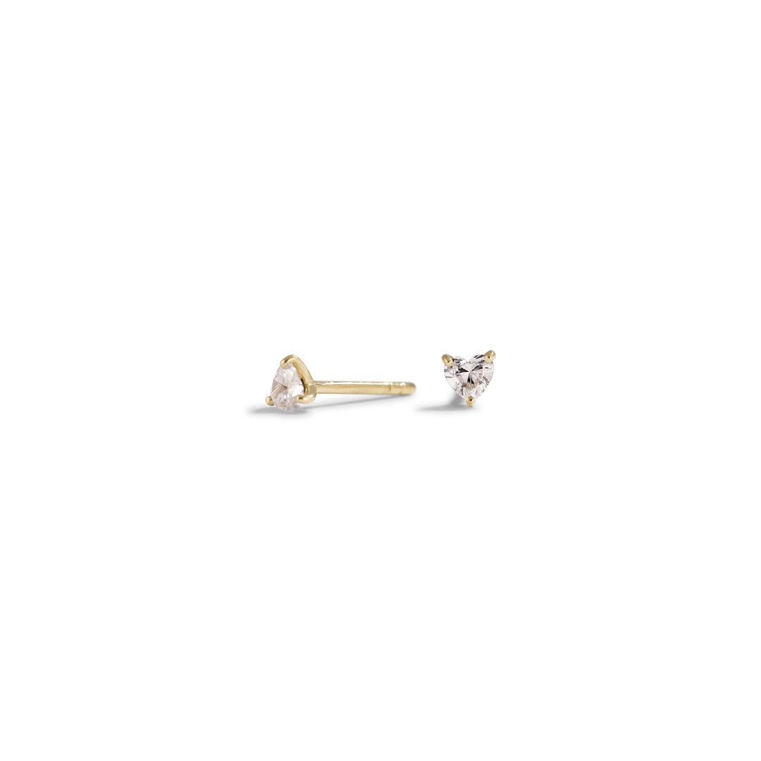 Hjerte solitaire ørestikker med 2x 0,10 ct.