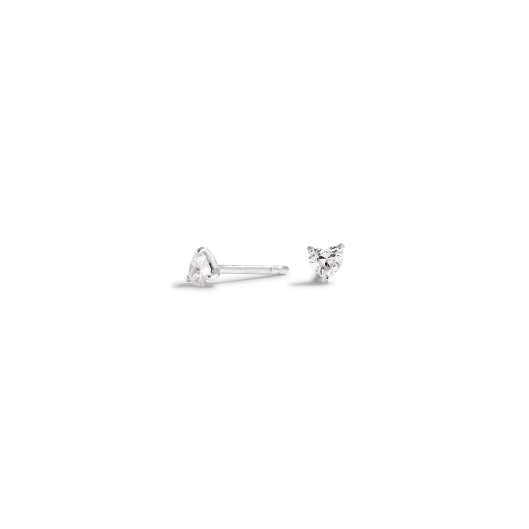 Hjerte solitaire ørestikker i hvidguld med 2x 0,10 ct.