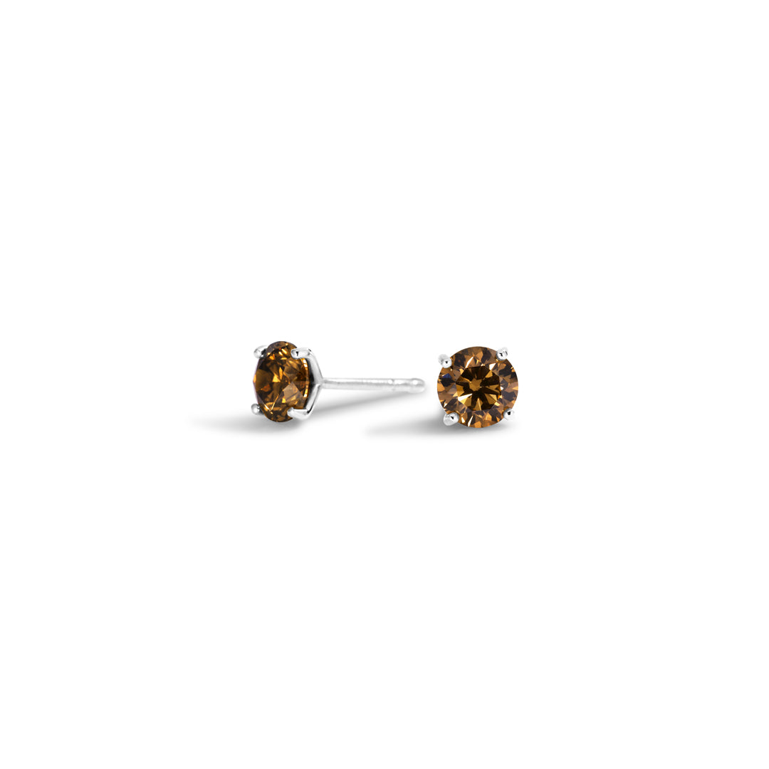 Solitaire ørestikker i hvidguld med 2x 0,73 ct. champagne