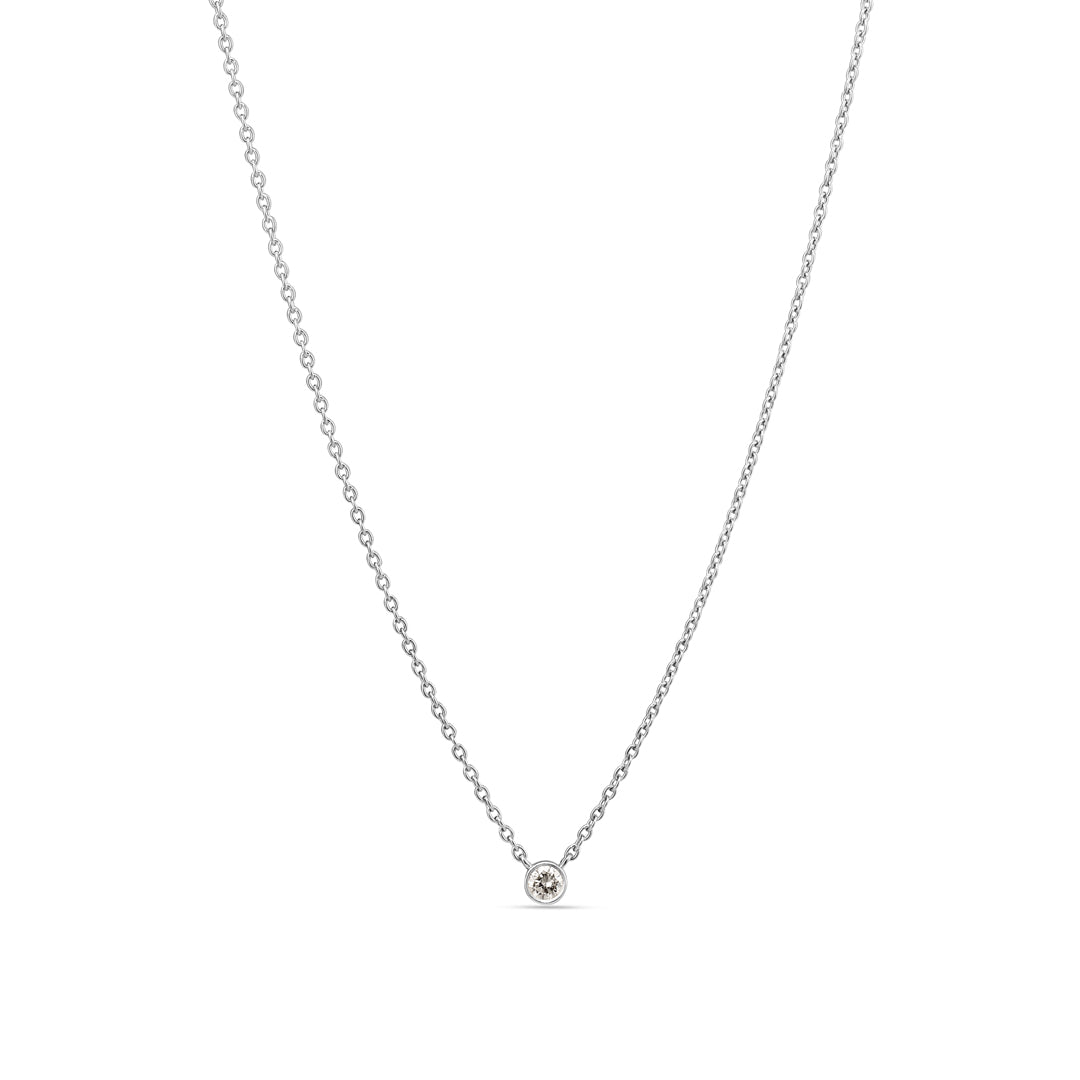 Bezel solitaire halskæde i hvidguld med 0,10 ct.