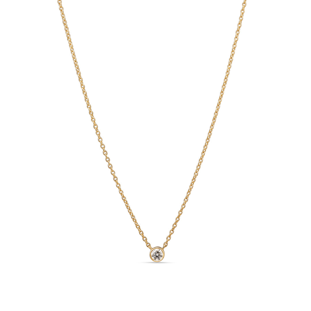 Bezel solitaire halskæde i hvidguld med 0,15 ct.