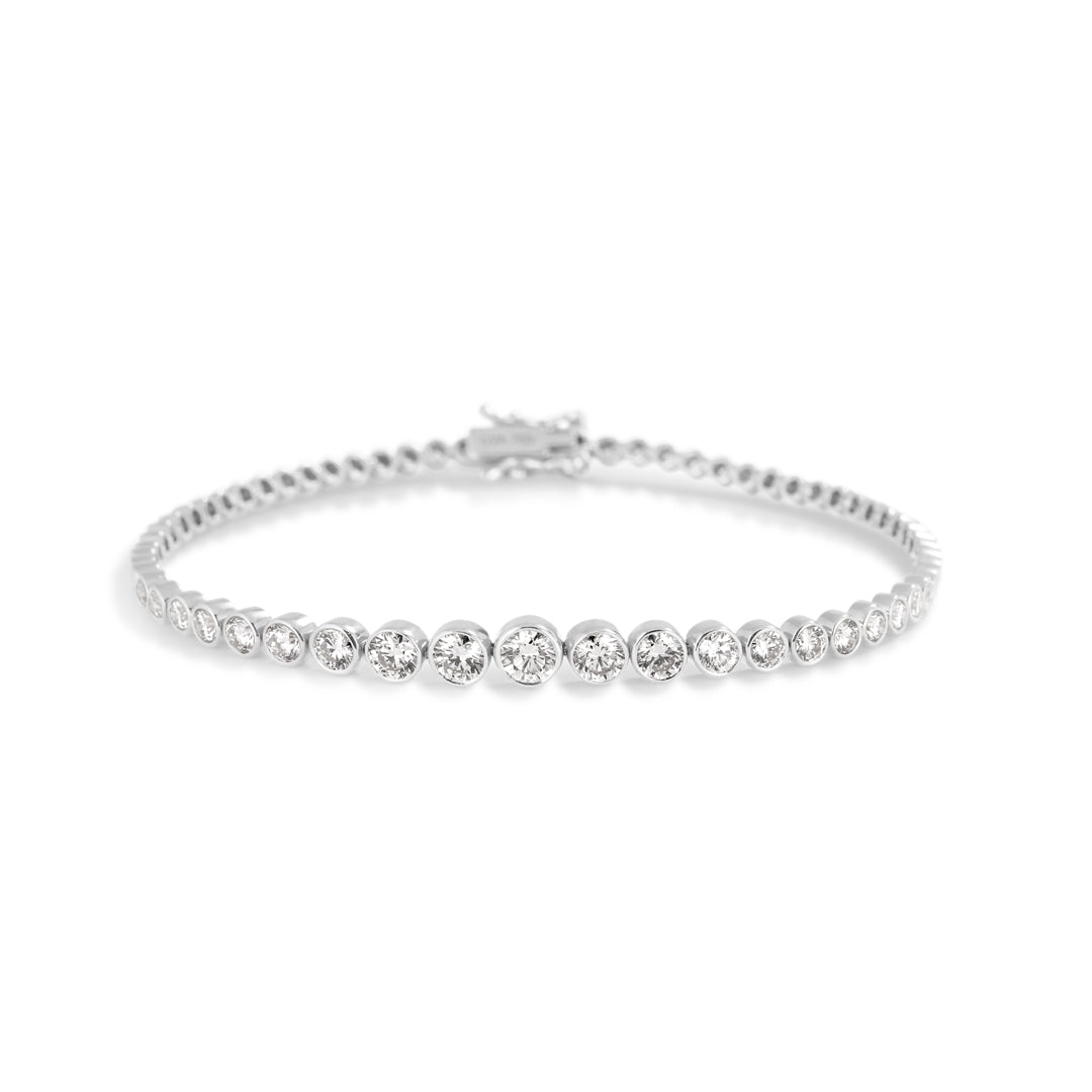 Tennisarmbånd graduerende bezel i hvidguld med i alt 3,20 ct.